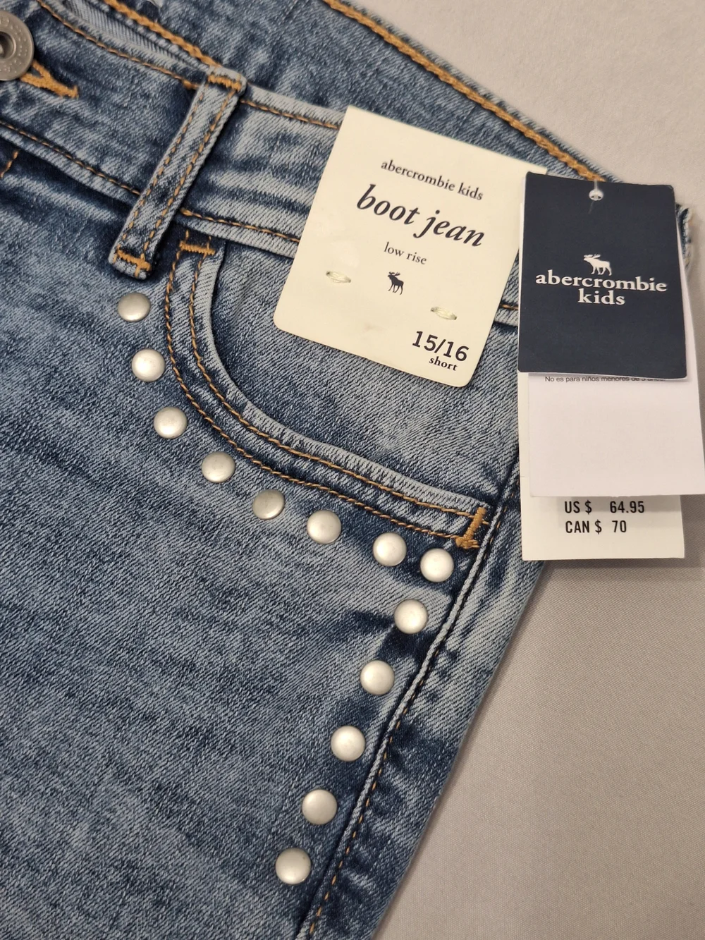 abercrombie kids Light Blue Low Rise Boot Jeans with Studded Detail- 15/16 Short